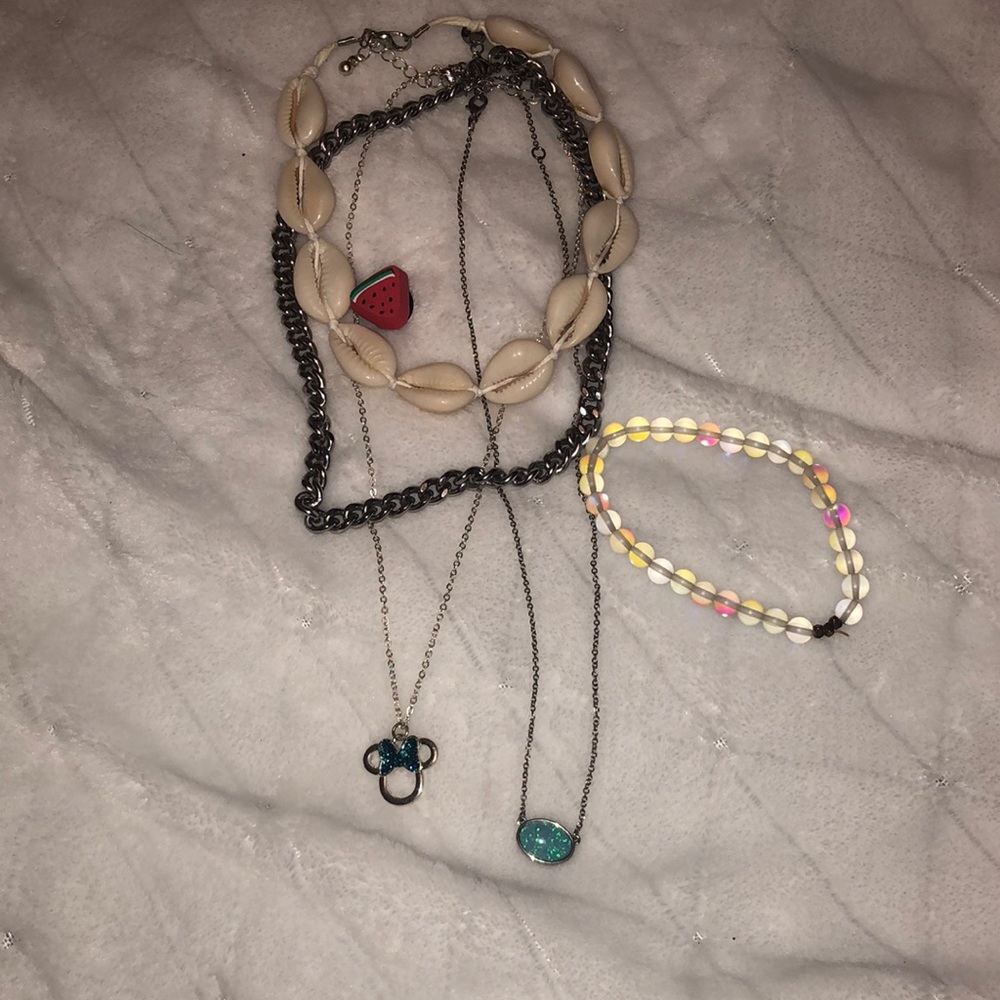 pack of necklaces, a bracelet and a gibbet (for crocs)
